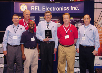 RFL team proudly displaying the 2007 UTC Best Telecom Product Award.